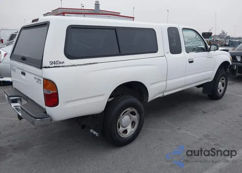 1999 Toyota Tacoma from USA, damaged, VIN 4TAWN72N9XZ467433